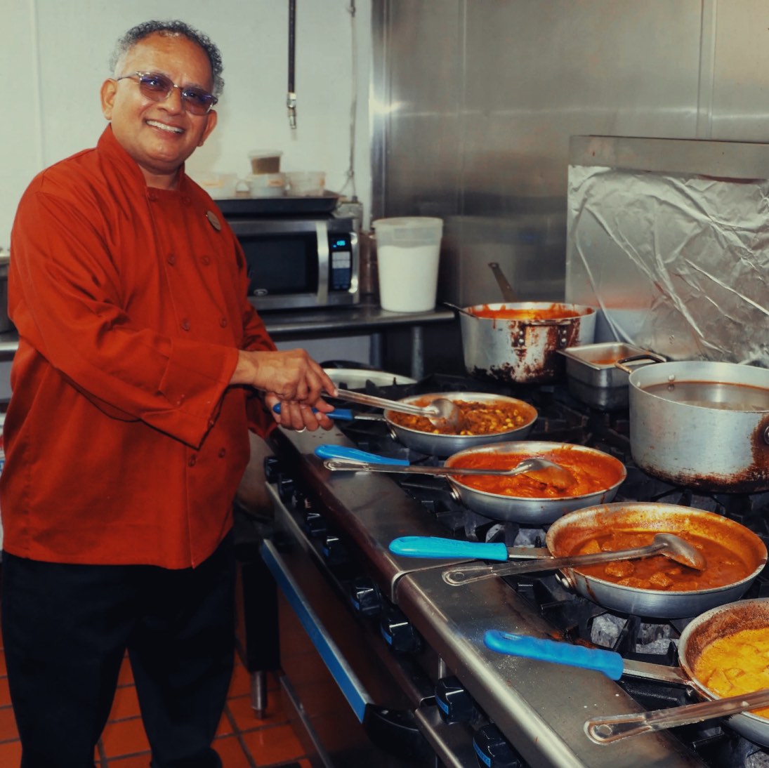 Guru Indian Restaurant Chef Uday Kadam cooking up delicious dishes