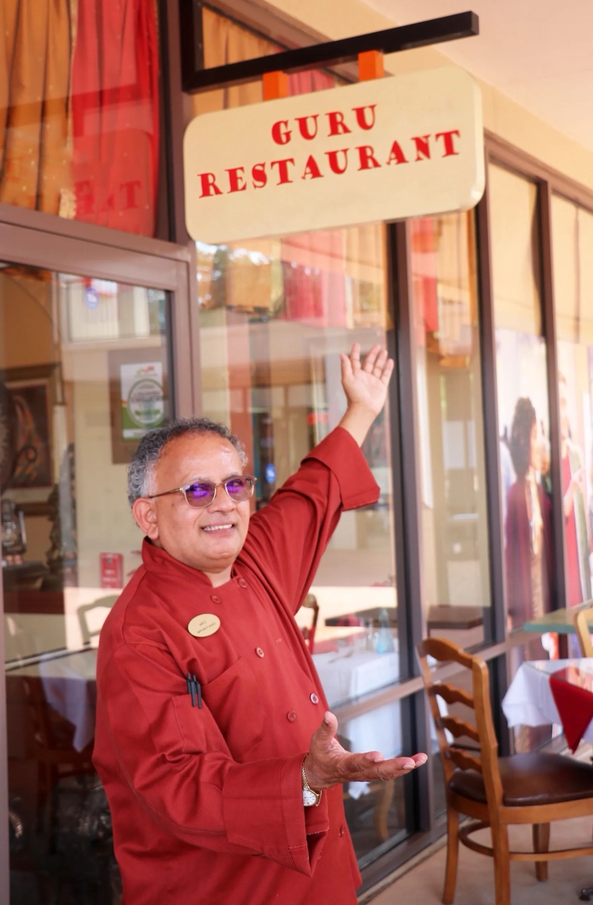 chef uday kadam hero photo posing outside the restaurant